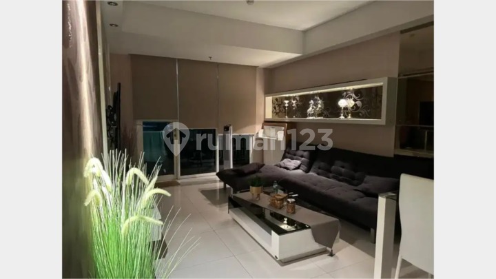 Apartemen Trillium di Pusat Kota dengan Taman Privat