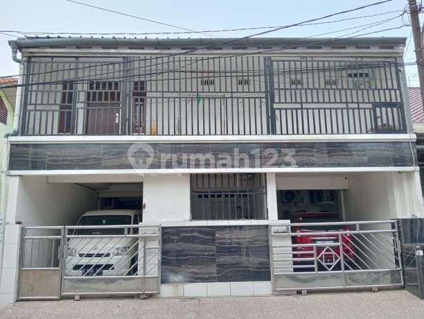 Murah, Dijual Cepat Mendekati NJOP. Rumah 2 Lantai di Komp Bea Cukai, Sukapura