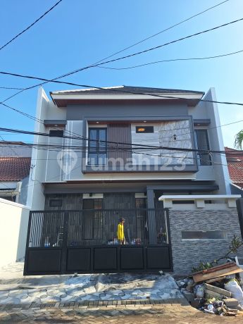 Rumah Manyar Tengah Kota Surabaya Lebar 10 Hadap Selatan SHM