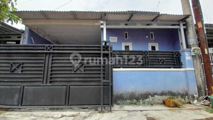 Over Kredit Rumah Puri Anggrek 