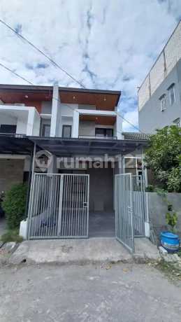 Two-Story House In The Royal Paka Housing Estate, Surabaya
