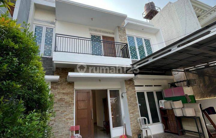Rumah minimalis 2 lantai komplek Duren Village Ciledug area di Bulevard  lt.161m  strategis
