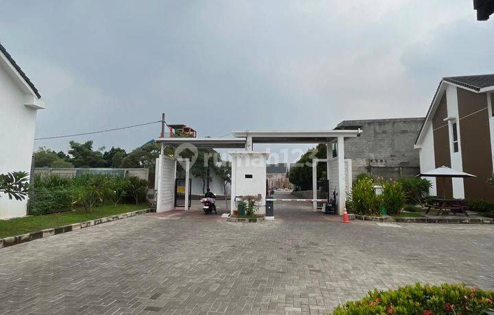 Rumah di Megah Aryana Karawaci 2 Lantai SHM Bagus Timur