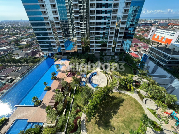 APARTEMET ONE GALAXY SURABAYA VIEW KOLAM RENANG DAN CITY