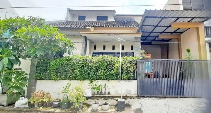house in the Perum Lembah Harapan housing complex near the UNESA Lidah campus, close to PTC.