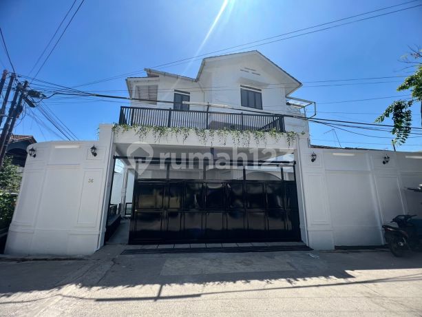 Twin House Auction Sari Indah Bandung