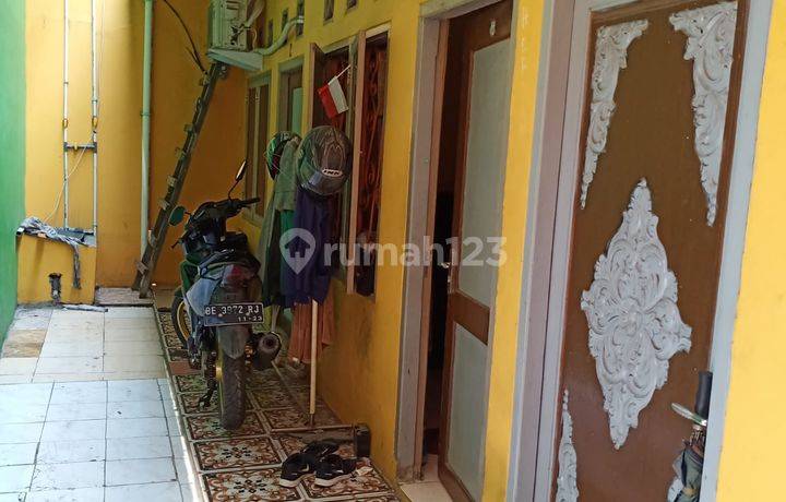Dijual rumah kontrakan & kios di Perumnas Tangerang