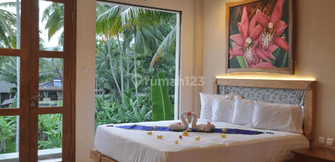 Family Room/Villa with Balcony and Direct Access to Beach – 36 sqm at Hotel Crystal Beach Bali (Karangasem, Candi Dasa) 1