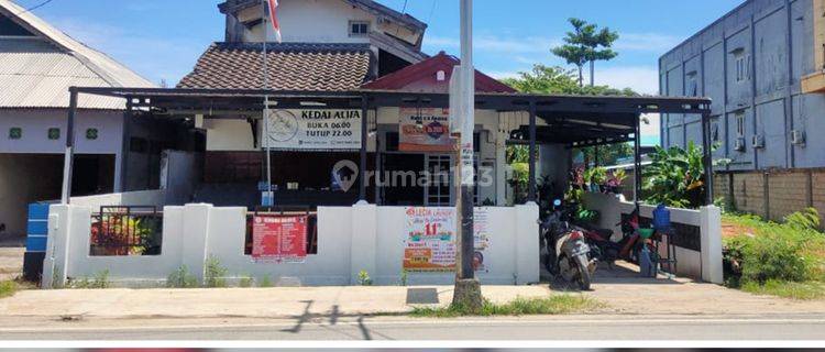 RUMAH TEPI JALAN SINGKAWANG.JL ALIANYANG 1