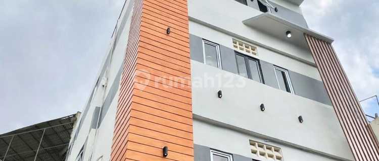 Modern 4-Floor Boarding House with 21 Rooms Fully Occupied, Strategic Location in Tomang 1