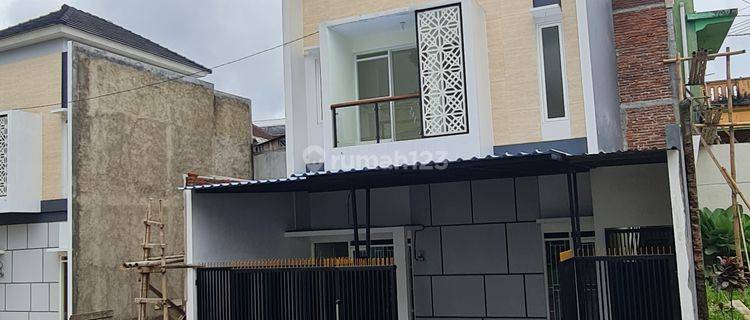 Rumah 2 lantai dekat SHM depqn taman bunga kota batu 1