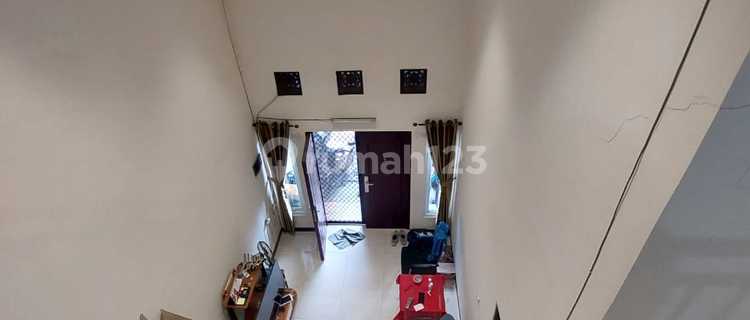 1.5-Story Minimalist House in a Comfortable Environment, Kosambi Baru Complex - West Jakarta 1