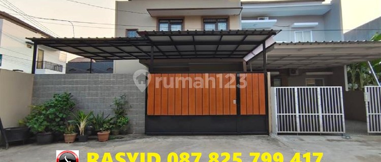 For Sale: Nice, Luxurious, Sturdy Red Brick House, Wide Road Inside a One-Gate Cluster, Green, Comfortable in Kodau, Jati Mekar Near Jatiwarna Toll, Pondok Gede, Bekasi City. 1