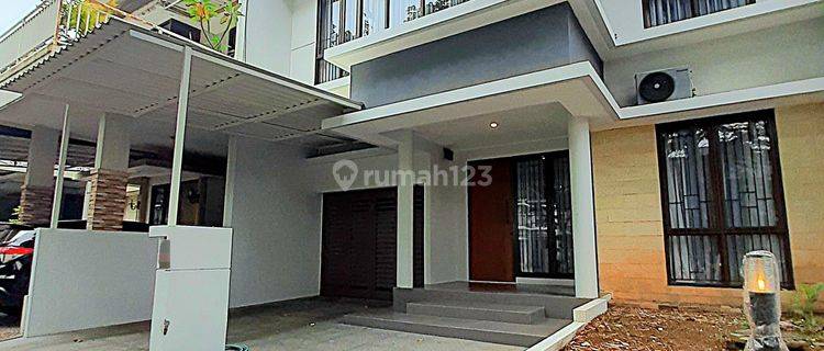 Rumah Modern 2 Lantai Bagus Semi Furnished Lokasi Menghadap Taman 1