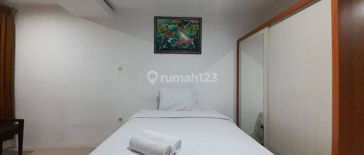 Studio Furnished Apartemen Green Park Yogyakarta By Travelio 1