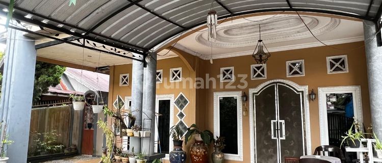 Comfortable Green Strategic 2-Story House in Singkawang City 1