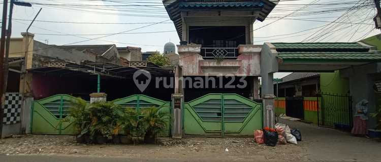 Disewakan Rumah 1,5 Lantai di Pinggir Jalan Raya. 1