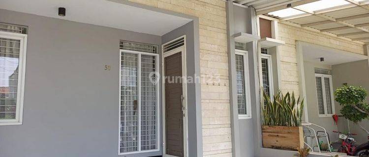 Rumah Dijual Minimalis di Cluster Taman Kopo Indah V 1