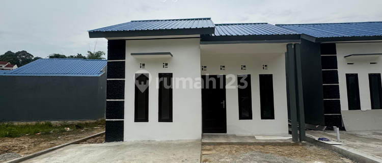 Rumah Cantik Siap Huni Konsep Tunggal 1