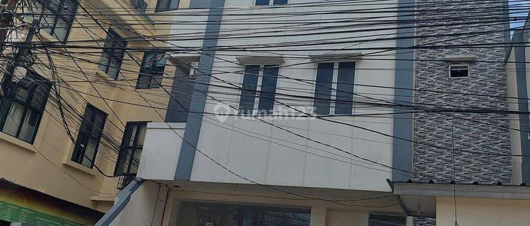 Rumah kost di Jalan tawakal raya 4 Lantai SHM 50 kamar 1