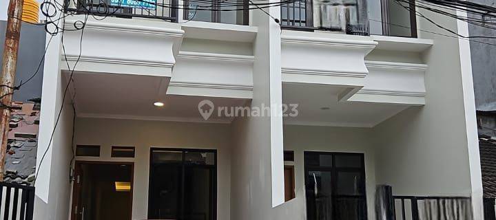 Rumah taman ratu taman cosmos 3 Lantai SHM Baru jalan 3 mobil 1