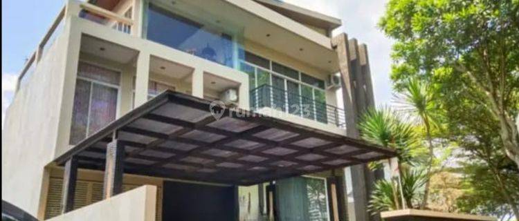 Rumah Tropical Minimalis Bagus di Graha Taman Pelangi  1