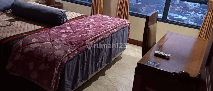 Disewakan Apartemen Grand Tropik Luas 144m² Full Furnished 1