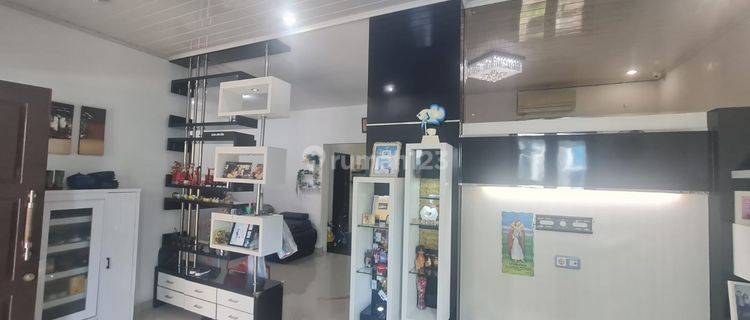 di JALAN H.ADAM MALIK 
PERUMAHAN CITRA BERINGIN REGENCY 1