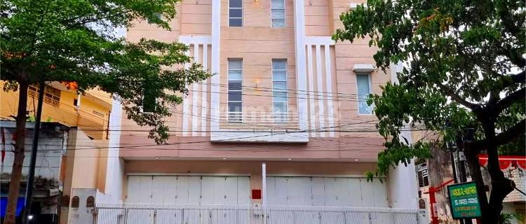 Two-unit shophouse on Jl. Ratulangi, Makassar. 1