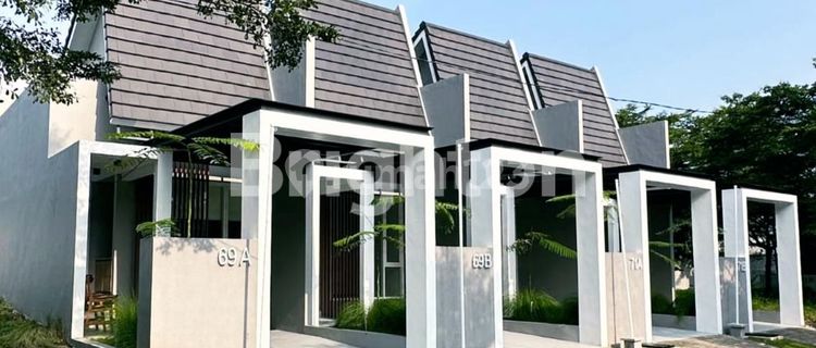 RUMAH MODERN DG INNER COURTYARD 900 JT AN DI ARAYA MALANG 1