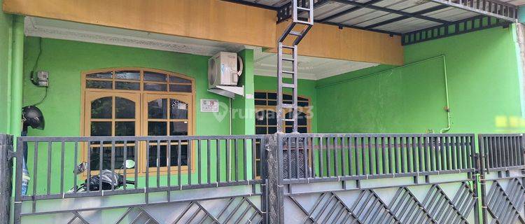 Dijual.Rumah  satu setengah lantai di  Perumnas 1 Tangerang (HTI) 1