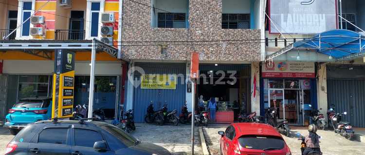 Two-door shop house plus warehouse on Sutomo Street (next to Marapalam gas station). 1