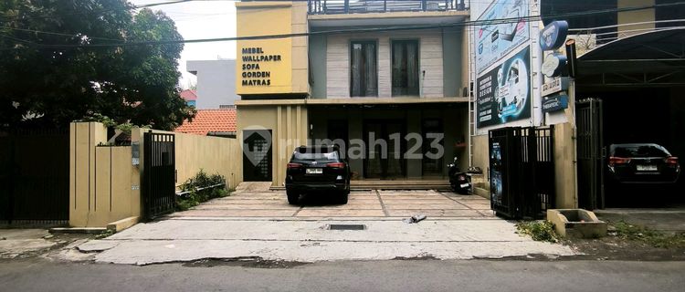 For Rent 300 M2 Shop House on Jalan Raya Sukomanunggal Jaya - West Surabaya - On Main Road - Spacious Car Parking - Wide Open Space Suitable for Various Businesses, Cafe, Restaurant, Bank, Office, Showroom, etc. 1