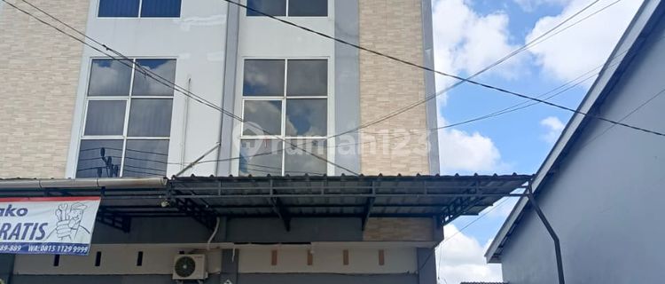 Shop House by the Road Ready for Business in a Bustling Environment on Perdamaian Street 1