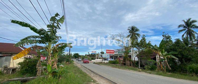 TANAH DAN 3 UNIT BANGUNAN RUMAH DIPINGGIR JALAN RAYA 1