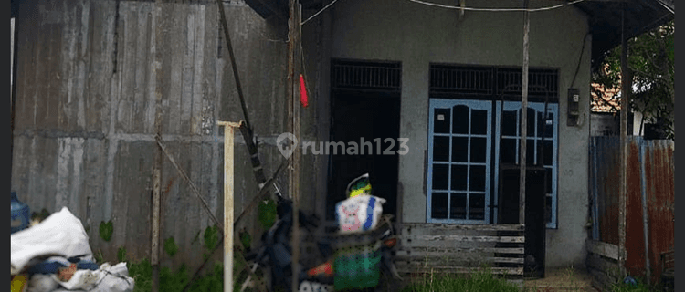 Rumah Dengan Lokasi Strategis di Jalan Purnama 1