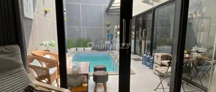 Dijual Rumah Minimalis dengan Kolam Renang di Pondok Hijau 1