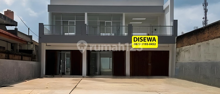 New 2-Door 2-Story Row House by Wolter Monginsidi Roadside. 1