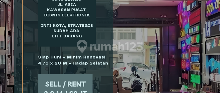 For sale/rent. Shop house on Asia St. Located in the Electronics Center, has a goods lift. 1