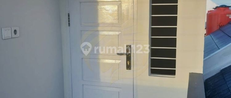 Ready-to-Occupy City Center House with 3 Bedrooms in Grand City Balikpapan 1