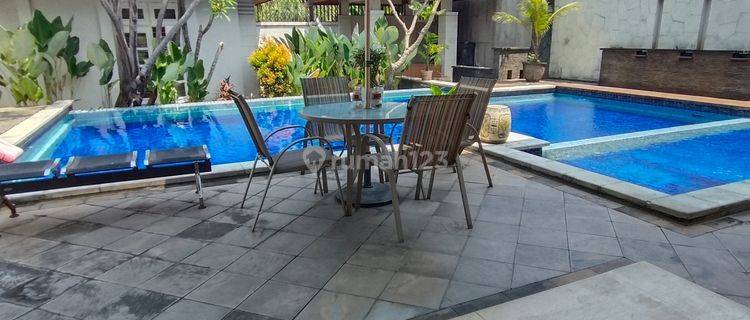 Rumah Mewah 2 Lantai Halaman Luas Dengan Swimming Pool Semi Furni 1