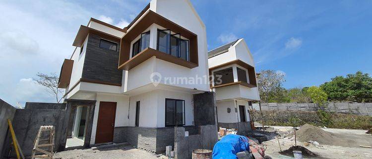 Two-story minimalist house in Kampial Nusa Dua  1