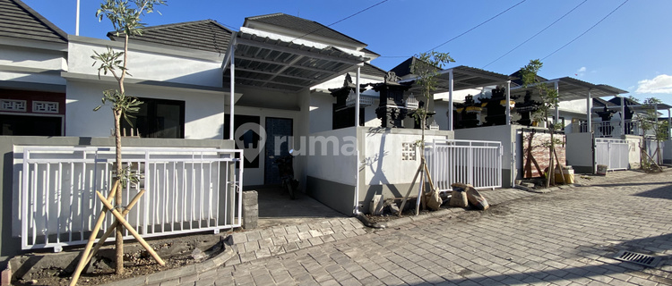 RUMAH MINIMALIST DI NUSA DUA DALAM CLUSTER PERUMAHAN 1