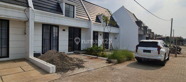 Dijual rumah modern di kota Bekasi di Cimuning 1