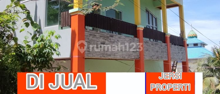 Own a 2-story boarding house for long-term investment. 1