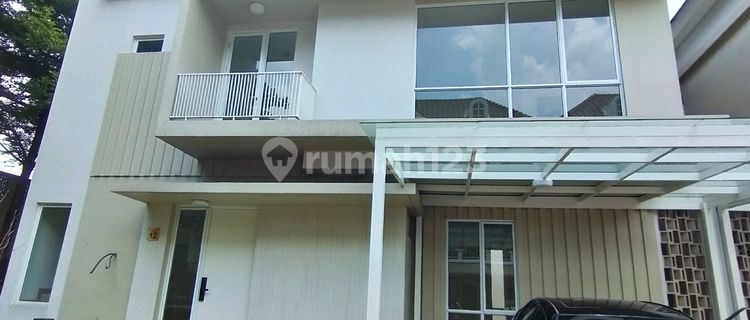 Two-story ivory house in Serpong. 1