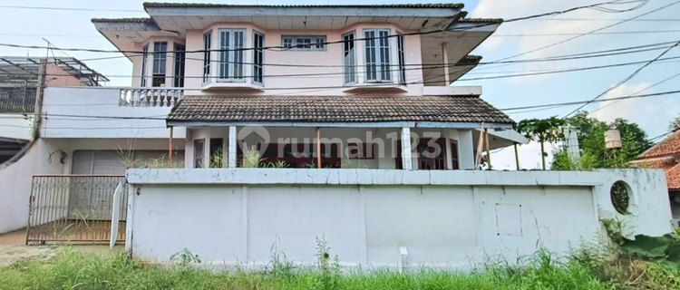 For sale cheap corner house spacious on Bangka-Bengkalis street, in Cinere - Depok which is shady and cool 1