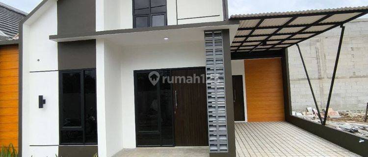 Rumah Modern Model Mezzanine Konsep Cluster 1