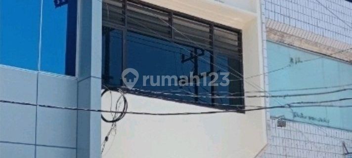 3-Storey Shop House on Raya Dharmahusada. Facing the Main Road 1