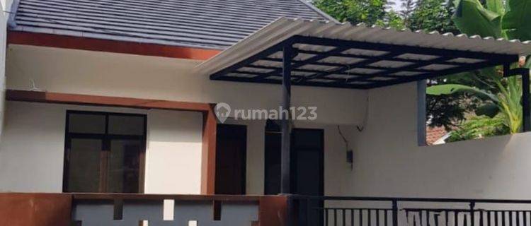 Rumah Minimalis Hadap Utara Dalam Cluster Di Graha Raya 1